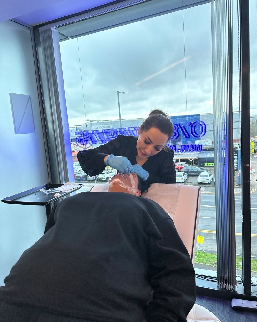 Aesthetic practitioner performing a prescriber-led treatment at Bury Healthcare Aesthetics clinic in Bury