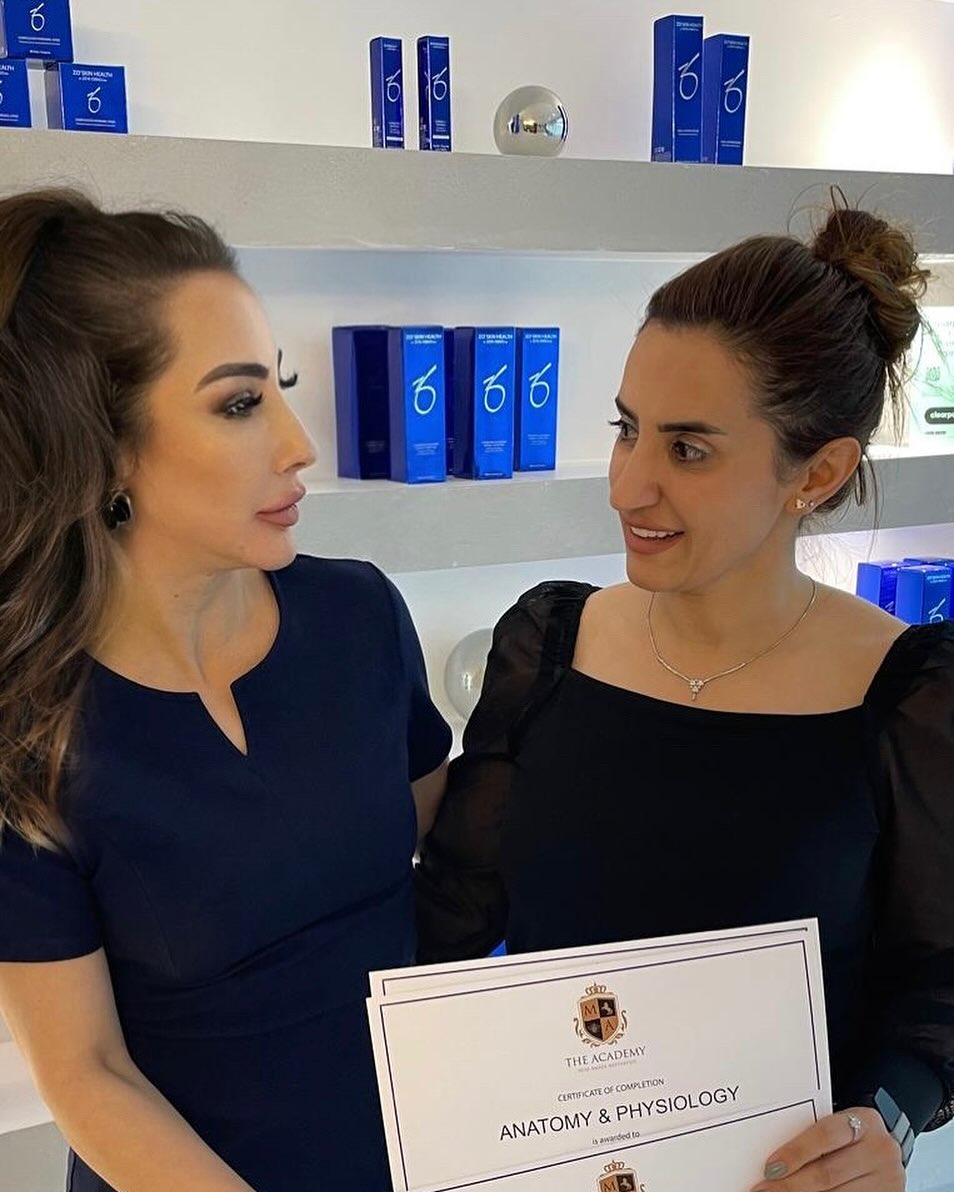 Freshta, lead trainer at Bury Aesthetics Academy, holding an Anatomy and Physiology certificate
